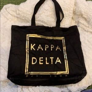 Black and gold Kappa Delta tote bag